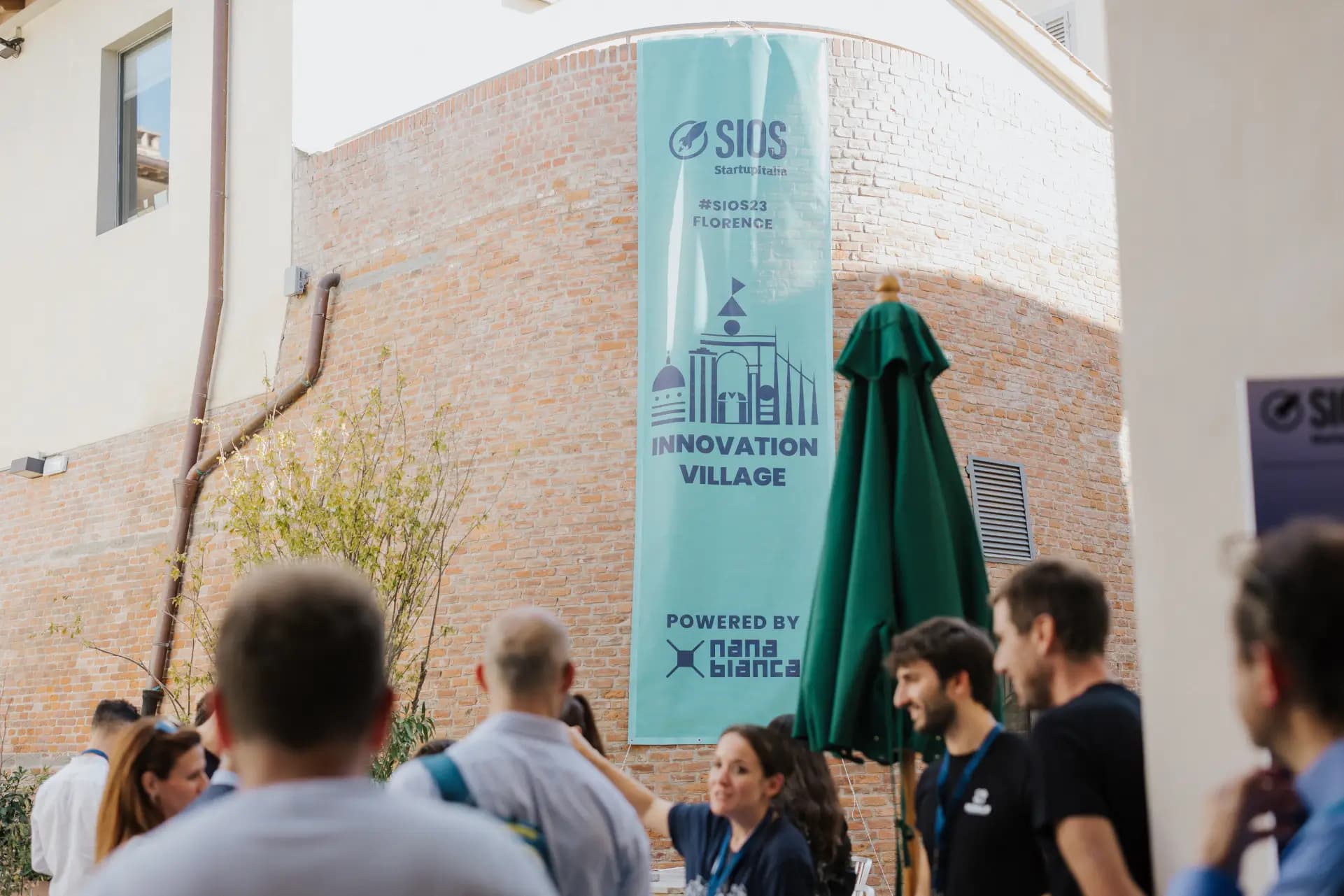 Area accoglienza del SIOS Firenze, evento dedicato all’innovazione, alle startup e al futuro del lavoro digitale.